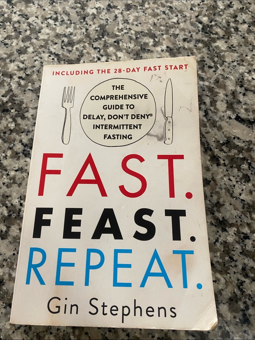 Fast. Feast. Repeat. by Gin Stephens - White Cover with Red, Black, Blue Text